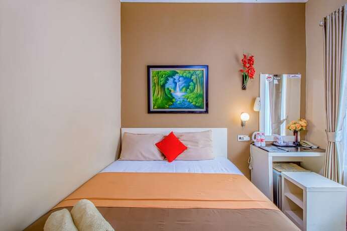 Imagen de la habitación del Hotel Puri Singgasana Ambarukmo. Foto 4