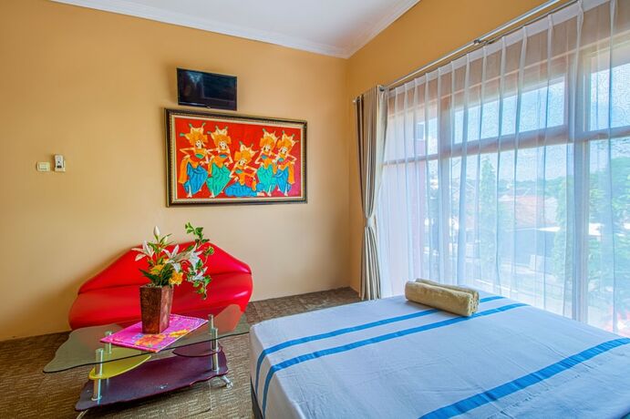 Imagen de la habitación del Hotel Puri Singgasana Ambarukmo. Foto 13