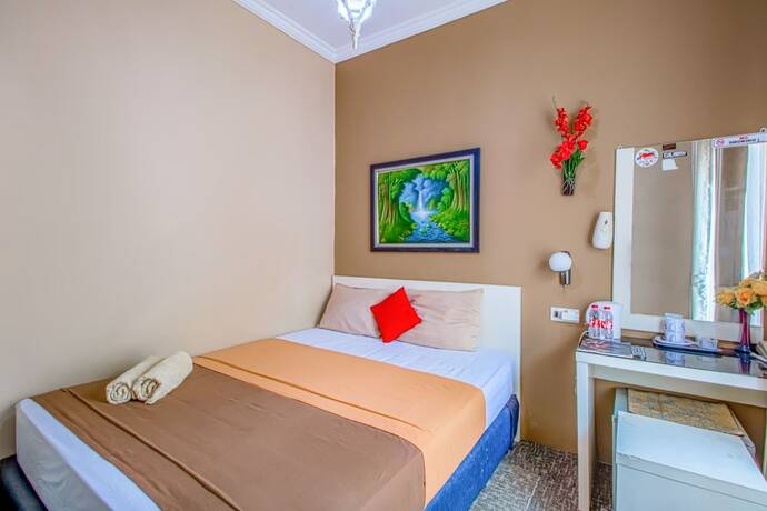 Imagen de la habitación del Hotel Puri Singgasana Ambarukmo. Foto 14