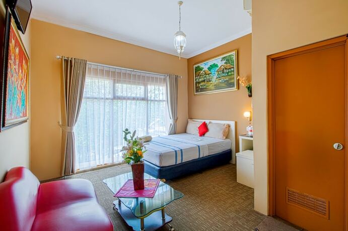 Imagen de la habitación del Hotel Puri Singgasana Ambarukmo. Foto 17