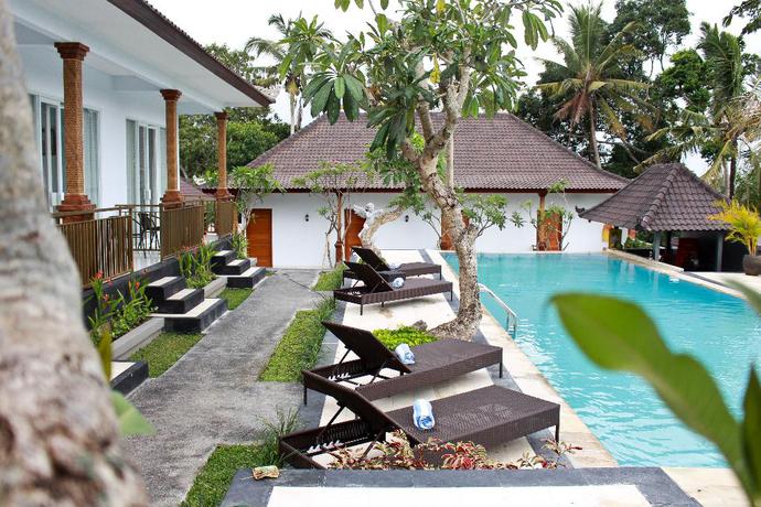 Imagen de la piscina del Hotel Puri Suksma Ubud. Foto 20
