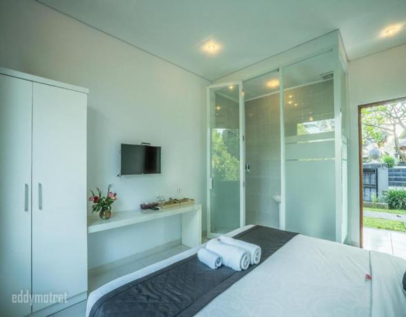 Imagen de la habitación del Hotel Puri Suksma Ubud. Foto 17