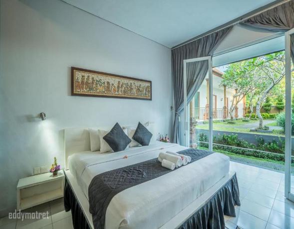 Imagen de la habitación del Hotel Puri Suksma Ubud. Foto 18
