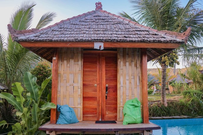 Imagen de la habitación del Hotel Puri Sunny Camping. Foto 11