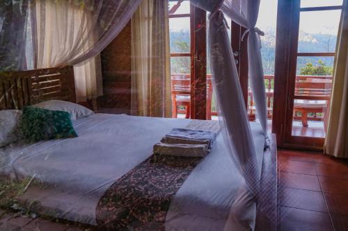 Imagen de la habitación del Hotel Puri Sunny Guesthouse. Foto 7