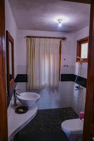 Imagen de la habitación del Hotel Puri Sunny Guesthouse. Foto 8