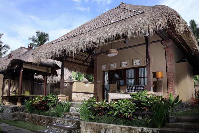 Imagen de la habitación del Hotel Puri Taman Sari. Foto 1