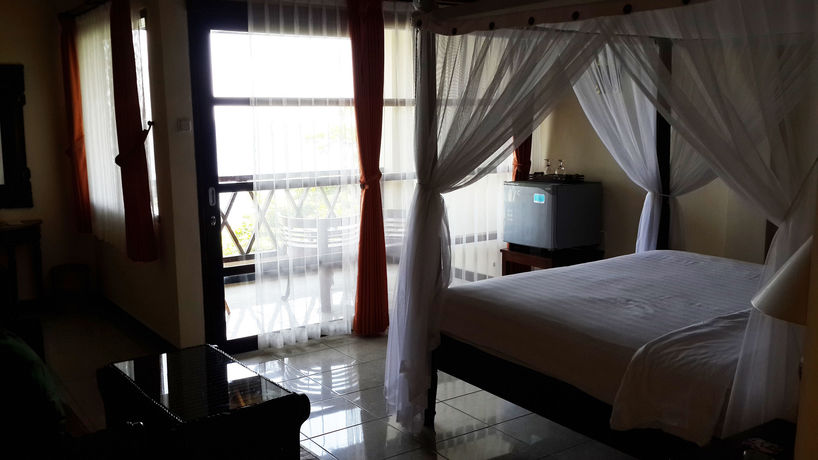 Imagen de la habitación del Hotel Puri Wirata Dive Resort And Spa. Foto 9