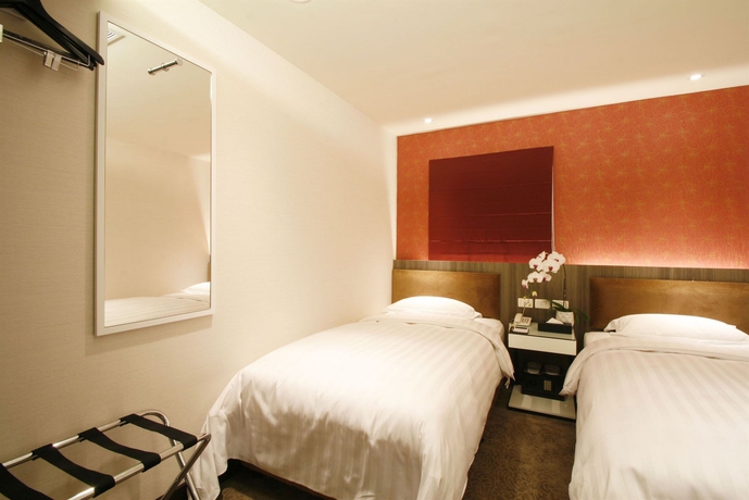 Imagen de la habitación del Hotel Puri Ximen Branch. Foto 2
