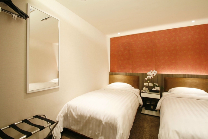 Imagen de la habitación del Hotel Puri Ximen Branch. Foto 6