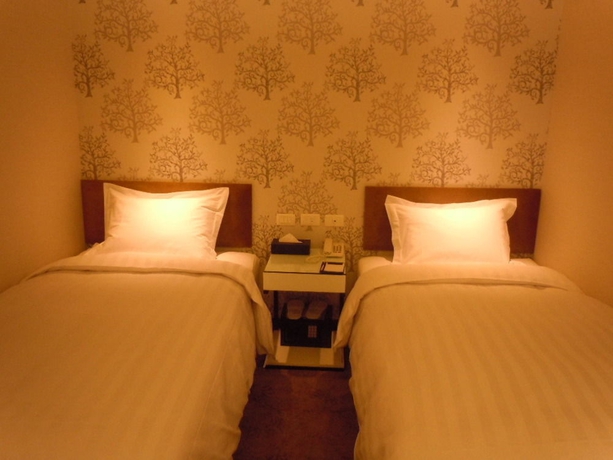 Imagen de la habitación del Hotel Puri Ximen Branch. Foto 7