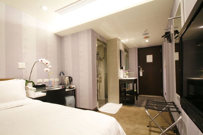 Imagen de la habitación del Hotel Puri Ximen Branch. Foto 8