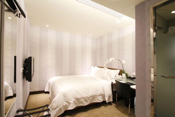 Imagen de la habitación del Hotel Puri Ximen Branch. Foto 9