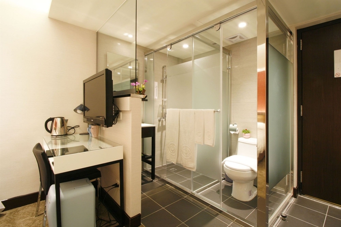 Imagen de la habitación del Hotel Puri Ximen Branch. Foto 11