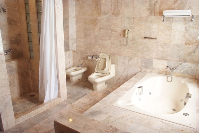 Imagen de la habitación del Hotel Purimas Beach Hotel and Spa. Foto 10