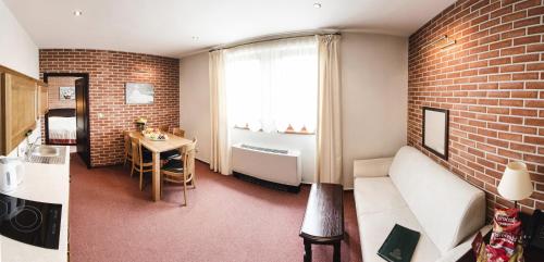 Imagen de la habitación del Hotel Purkmistr Beer & Spa Resort. Foto 6
