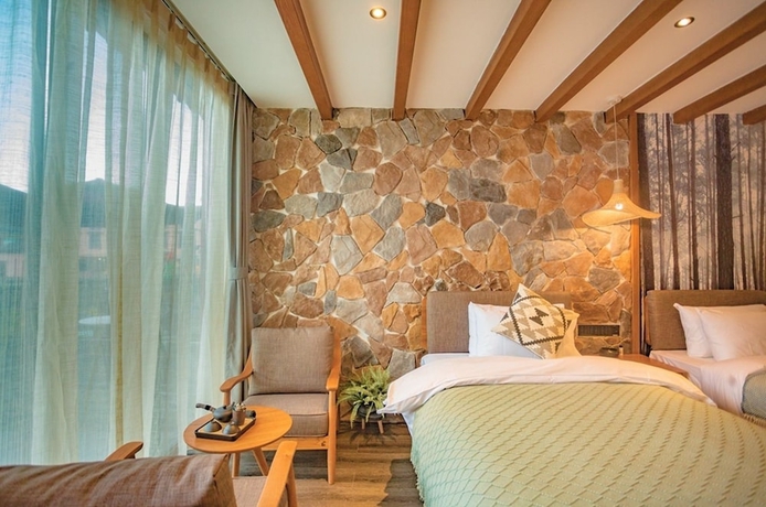 Imagen de la habitación del Hotel Purmei Lugu Lake. Foto 4