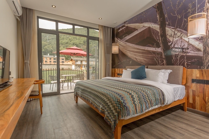 Imagen de la habitación del Hotel Purmei Lugu Lake. Foto 5
