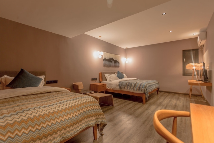 Imagen de la habitación del Hotel Purmei Lugu Lake. Foto 6