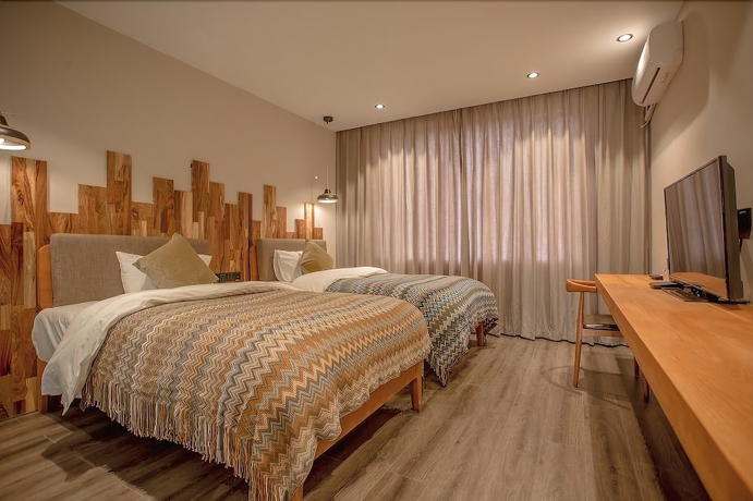 Imagen de la habitación del Hotel Purmei Lugu Lake. Foto 8
