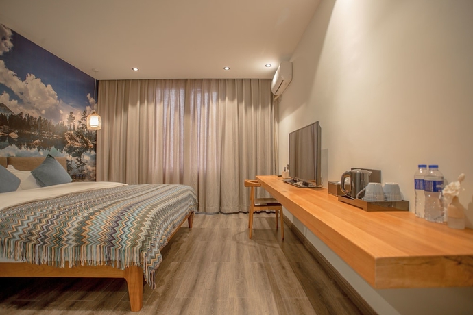 Imagen de la habitación del Hotel Purmei Lugu Lake. Foto 10