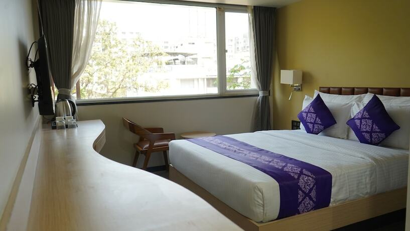 Imagen de la habitación del Hotel Purple Beds by VITS Dwarkesh. Foto 17