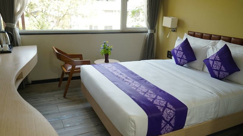 Imagen de la habitación del Hotel Purple Beds by VITS Dwarkesh. Foto 19
