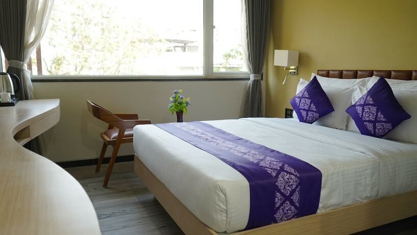 Imagen de la habitación del Hotel Purple Beds by VITS Dwarkesh. Foto 20