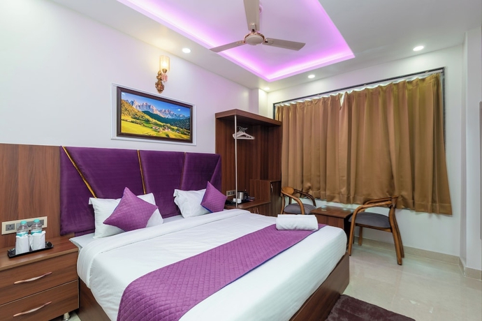 Imagen de la habitación del Hotel Purple Dot Haridwar. Foto 4