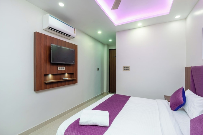 Imagen de la habitación del Hotel Purple Dot Haridwar. Foto 6