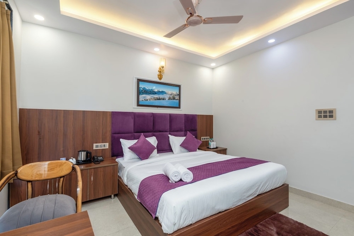 Imagen de la habitación del Hotel Purple Dot Haridwar. Foto 7