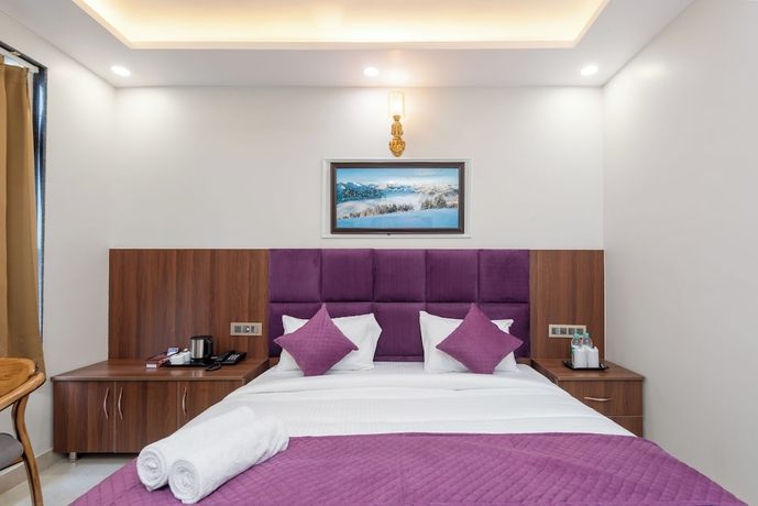 Imagen de la habitación del Hotel Purple Dot Haridwar. Foto 8