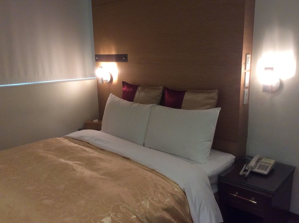 Imagen de la habitación del Hotel Purple Garden. Foto 7