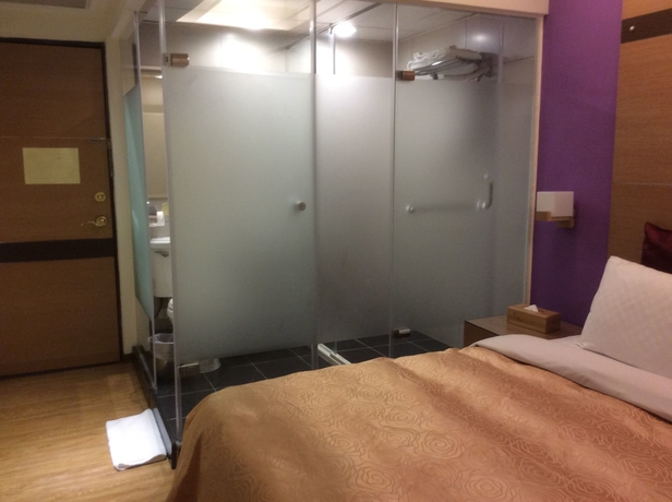 Imagen de la habitación del Hotel Purple Garden. Foto 10