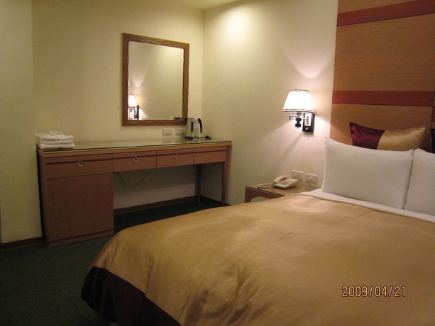 Imagen de la habitación del Hotel Purple Garden. Foto 14