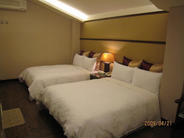 Imagen de la habitación del Hotel Purple Garden. Foto 15