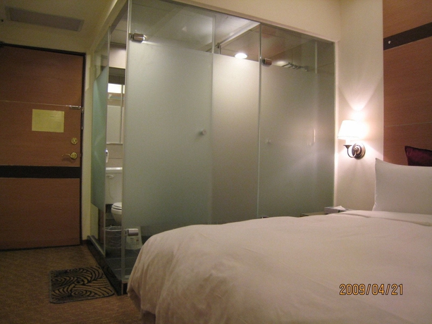 Imagen de la habitación del Hotel Purple Garden. Foto 16