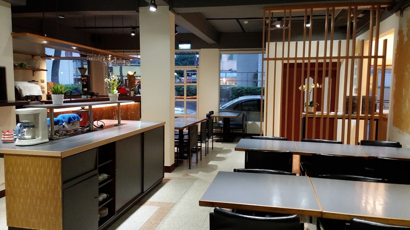 Imagen del bar/restaurante del Hotel Purple Garden. Foto 3