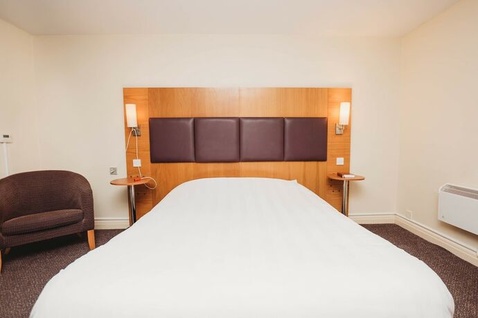 Imagen de la habitación del Hotel Purple Roomz. Foto 14