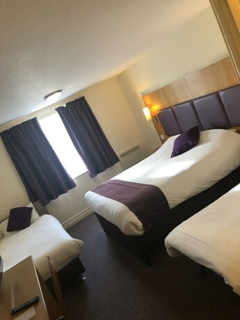 Imagen de la habitación del Hotel Purple Roomz. Foto 17