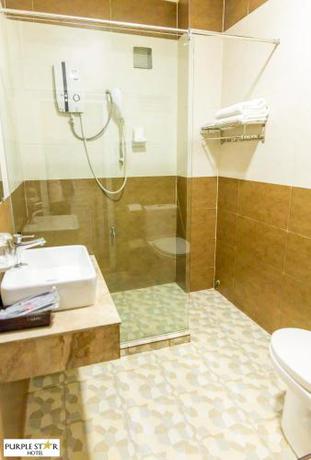 Imagen de la habitación del Hotel Purple Star. Foto 18