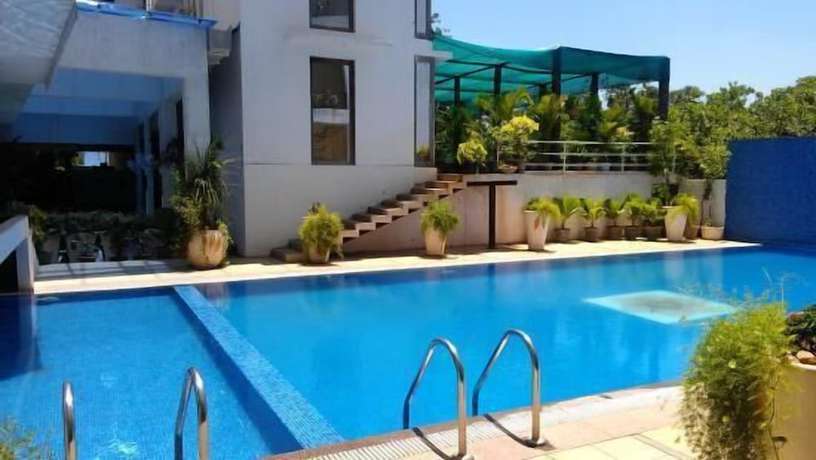 Imagen de la piscina del Hotel Purples Resorts. Foto 16