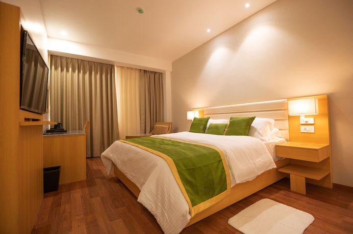 Imagen de la habitación del Hotel Pushkara Sarovar Portico Dibrugarh. Foto 3