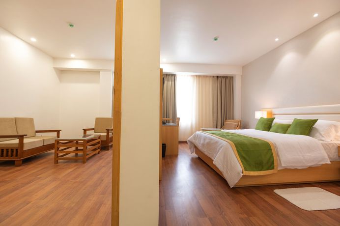 Imagen de la habitación del Hotel Pushkara Sarovar Portico Dibrugarh. Foto 4