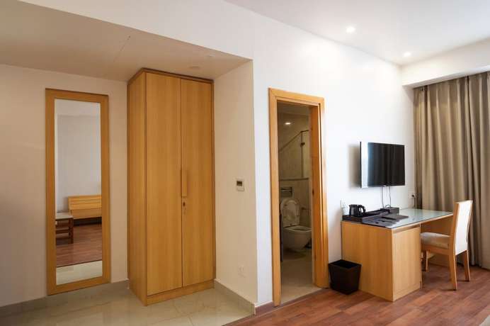 Imagen de la habitación del Hotel Pushkara Sarovar Portico Dibrugarh. Foto 6