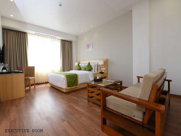 Imagen de la habitación del Hotel Pushkara Sarovar Portico Dibrugarh. Foto 10