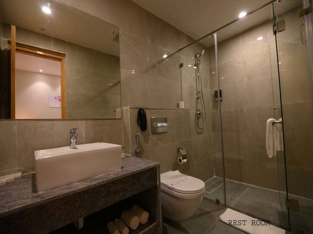 Imagen de la habitación del Hotel Pushkara Sarovar Portico Dibrugarh. Foto 11