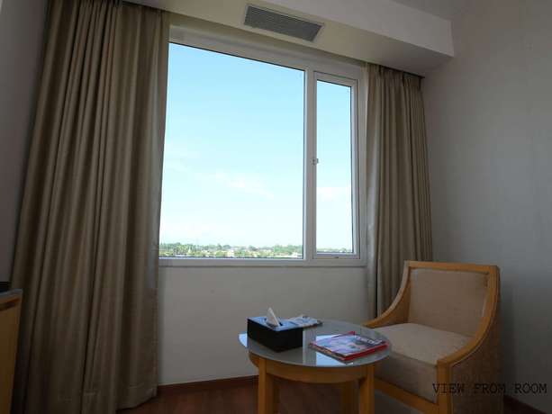 Imagen de la habitación del Hotel Pushkara Sarovar Portico Dibrugarh. Foto 12