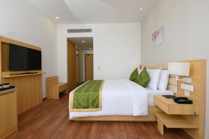 Imagen de la habitación del Hotel Pushkara Sarovar Portico Dibrugarh. Foto 13