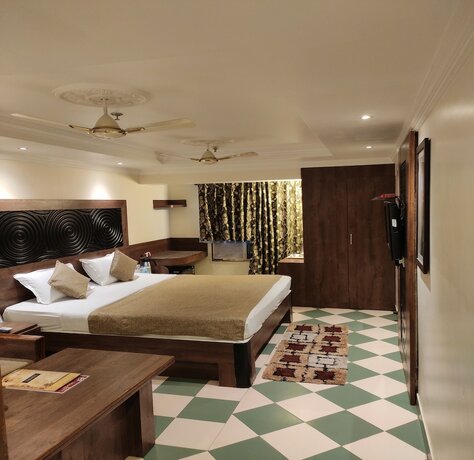 Imagen de la habitación del Hotel Pushpak. Foto 12